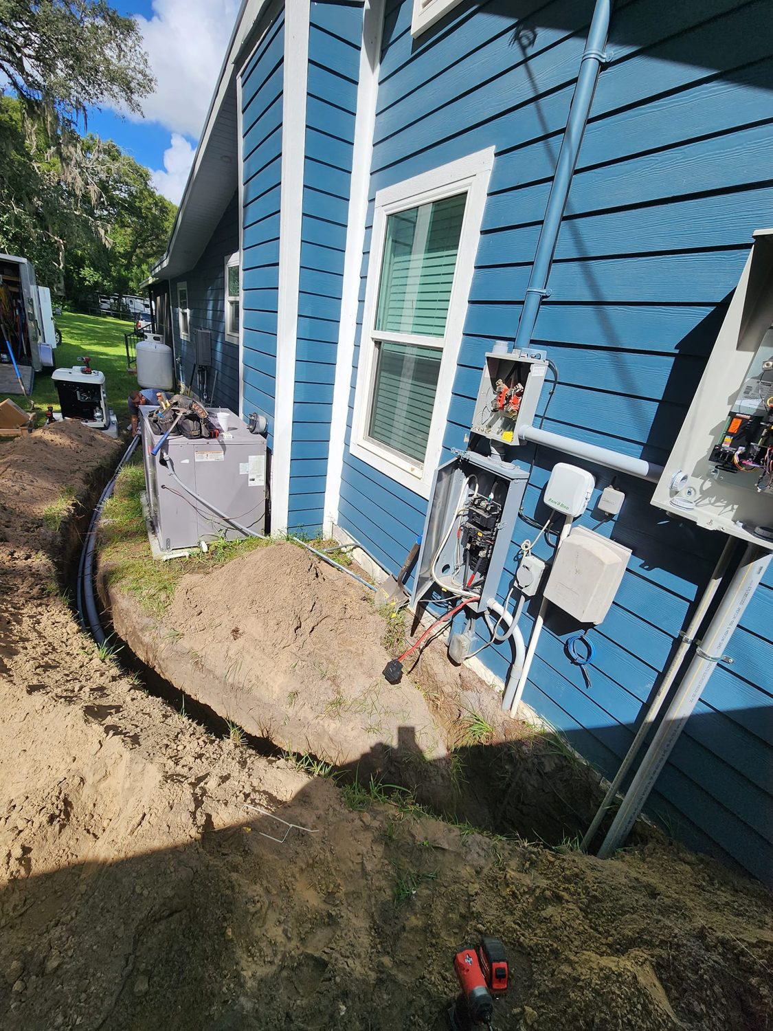 Electrical panel replacement in progress — new breakers and busbars