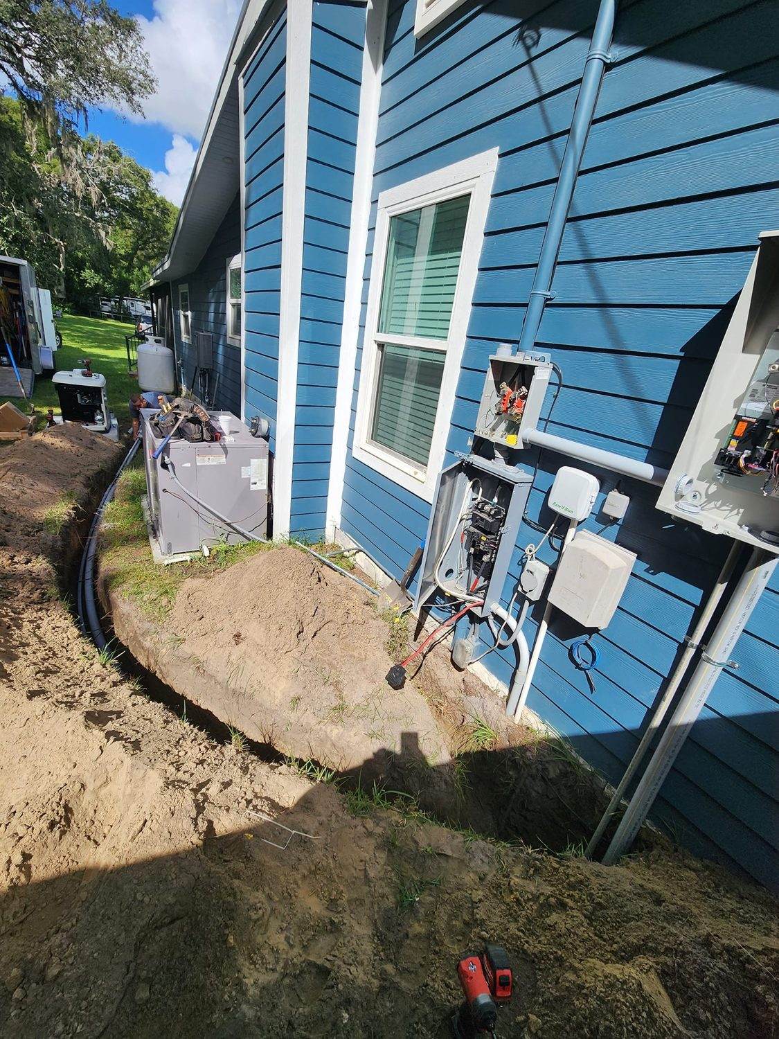 Electrical panel replacement in progress — new breakers and busbars